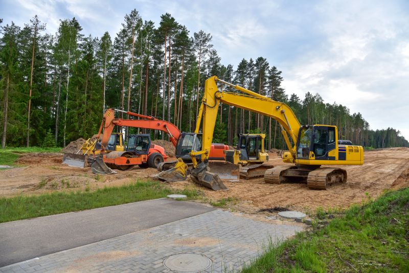 Prepare land for construction or landscaping